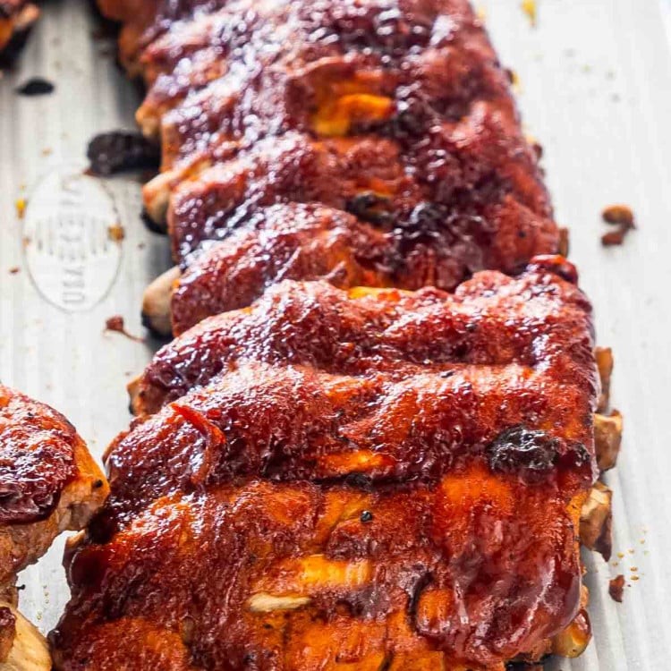 bbq ribs on a baking sheet.