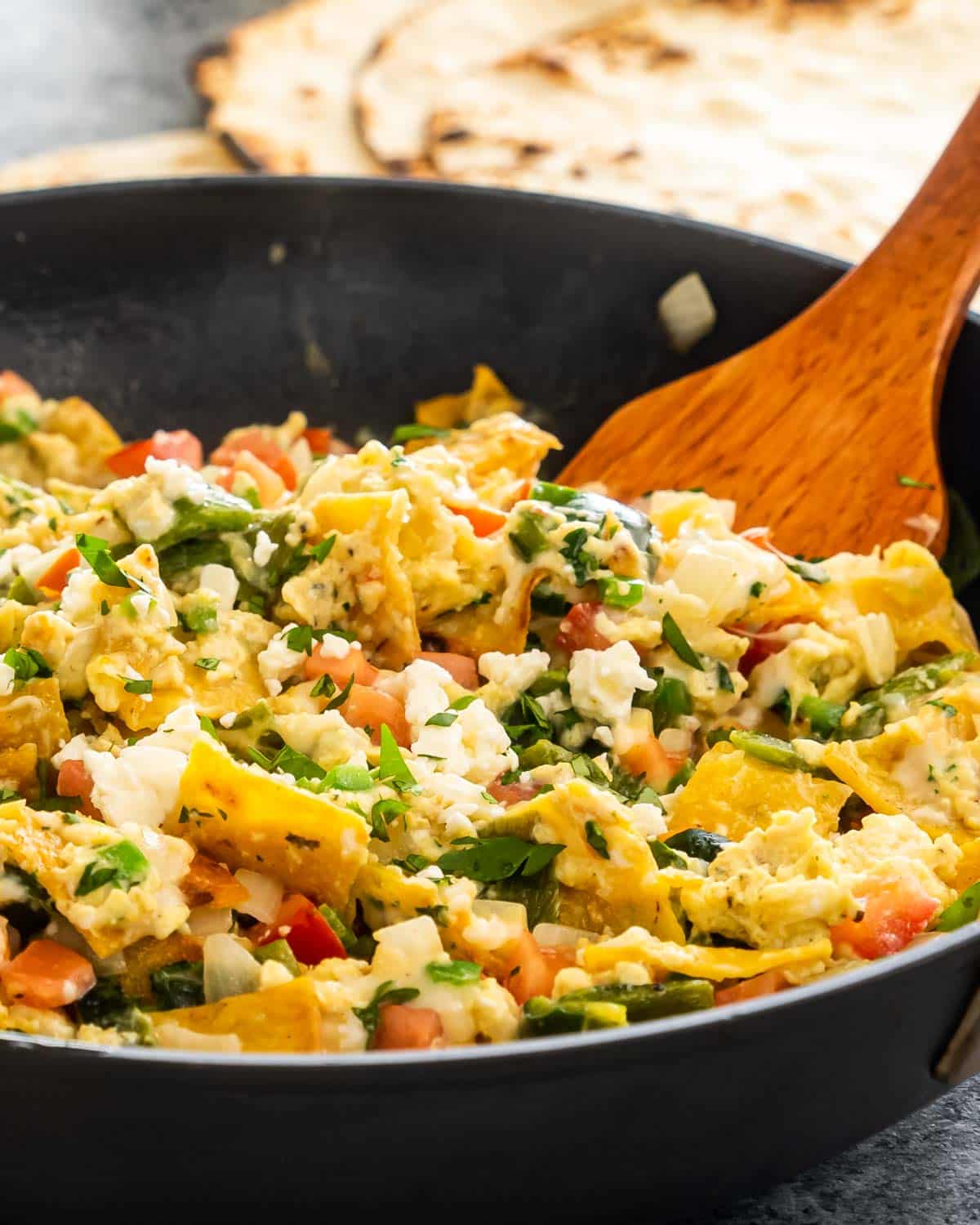 freshly made migas in a black skillet.