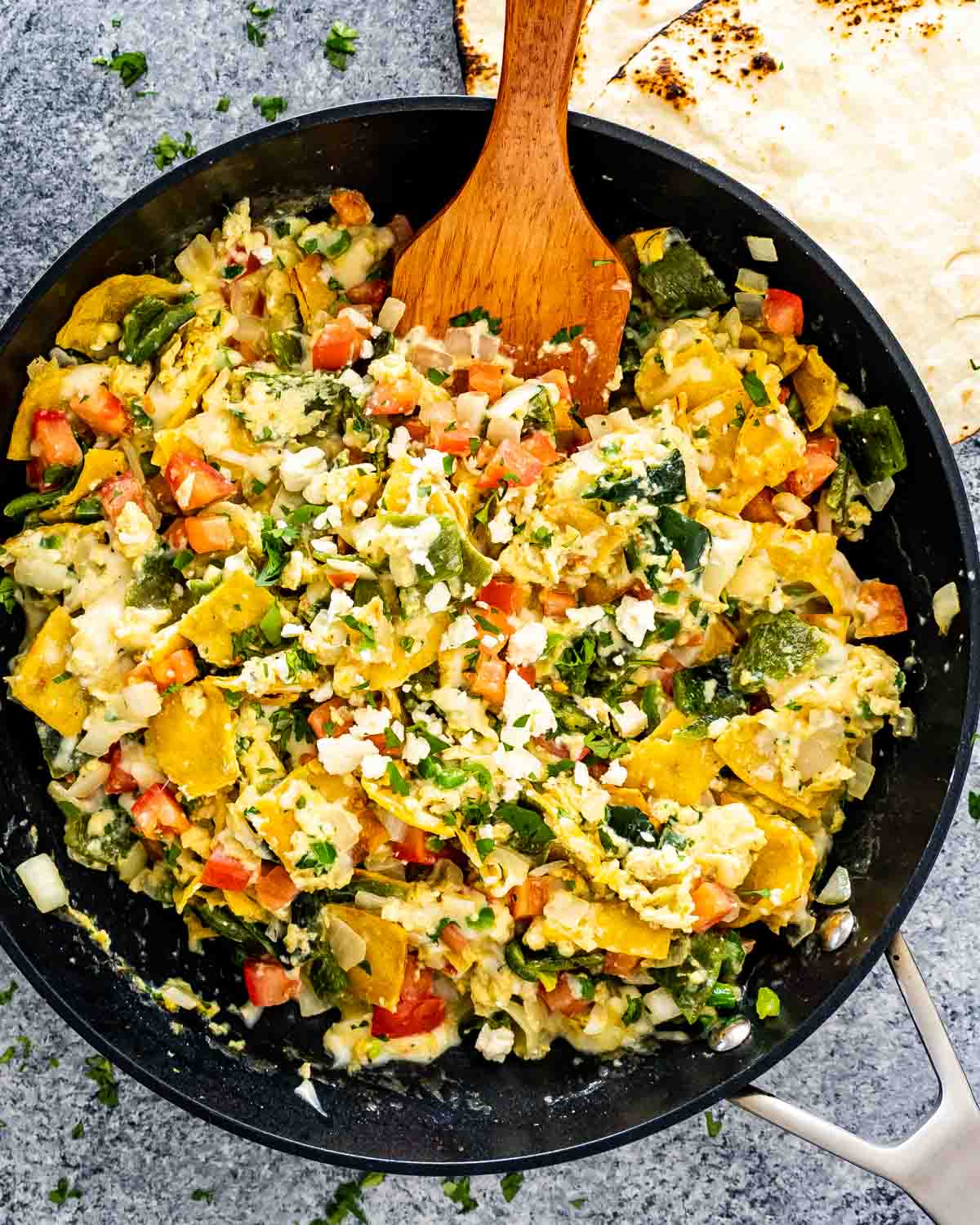 freshly made migas in a black skillet.